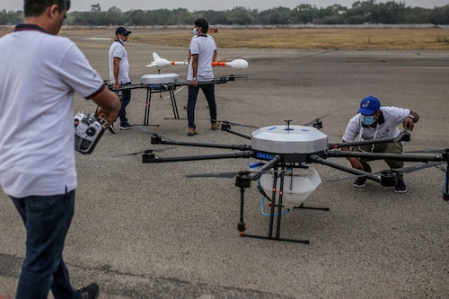 Workers test a CSIR-NAL octocopter drone at the Wings India 2022 Air Show held at Begumpet Airport in Hyderabad, India, on Thursday, March 24, 2022.
Image: Dhiraj Singh/Bloomberg via Getty Images Workers test a CSIR-NAL octocopter drone at the Wings India 2022 Air Show held at Begumpet Airport in Hyderabad, India, on Thursday, March 24, 2022.
Image: Dhiraj Singh/Bloomberg via Getty Images