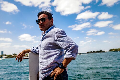 Jordan Belfort at his home in Miami Beach, Fla., April 10, 2022. Belfort, the inspiration for “The Wolf of Wall Street,â€ is marketing himself as a cryptocurrency guru. (Scott McIntyre/The New York Times)