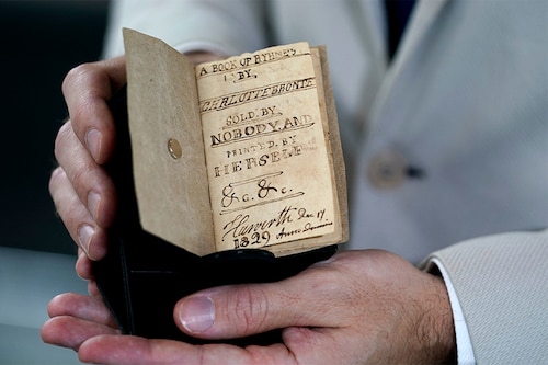 Titled "A Book of Ryhmes (sic) by Charlotte Bronte, Sold by Nobody, and Printed by Herself," the volume is hand-stitched in its original brown paper covers. (Credit: TIMOTHY A. CLARY/ AFP)