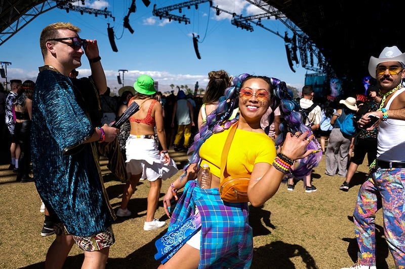 People attend the Coachella Valley Music and Arts Festival at Empire Polo Club in Indio, California, U.S., April 22, 2022.