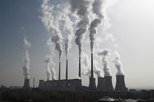 This photo taken on November 15, 2021 shows the coal-powered Datang International Zhangjiakou Power Station in Zhangjiakou.â€‹ (Credit: GREG BAKER/ AFP)