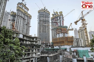 In Mumbai, noise barriers are mandated under the Development Control Rules at all new flyovers, to protect residents from traffic noise. Similar barriers can be used at construction sites too.  However, BMC building permissions are given without mitigation measures even though protecting health and environment are primary responsibilities of Government.
Image: Dhiraj Singh/Bloomberg via Getty Images