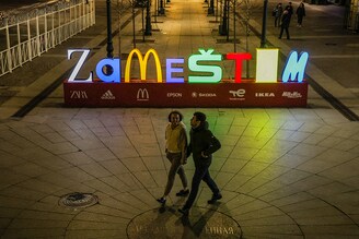 An installation reading "We will substitute", made up of the first letters of the names of companies that announced their exit from Russia, or suspension of activities there, is seen in the street in Saint Petersburg, Russia April 27, 2022.