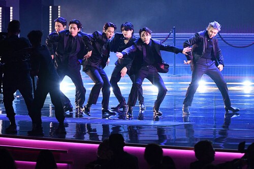 South Korean boy band BTS performs onstage during the 64th Annual Grammy Awards at the MGM Grand Garden Arena in Las Vegas on April 3, 2022. The lack of exemptions for BTS, who are credited with generating billions of dollars for the South Korean economy, has sparked fierce debate in the past. Image: VALERIE MACON / AFP