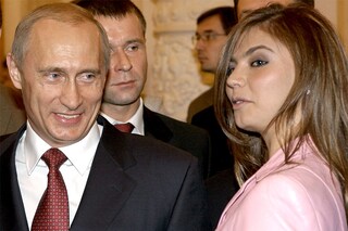 Russian President Vladimir Putin (L) smiles next to Russian gymnast Alina Kabaeva during a meeting with the Russian Olympic team at the Kremlin in Moscow, in this November 4, 2004 file photo. Image: Reuters&nbsp