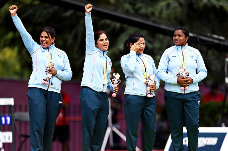 Gold medalists Lovely Choubey, Pinki, Nayanmoni Saikia, and Rupa Rani Tirkey of Team India celebrate during the Women"s Fours of Lawn Bowls Gold Medal ceremony on day five of the Birmingham 2022 Commonwealth Games at Victoria Park on August 02, 2022, on the Leamington Spa, England. Image: Nathan Stirk/Getty Images