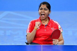 India"s para table tennis player Bhavina Hasmukhbhai Patel celebrates her victory against Nigeria"s Ifechukwude Christiana Ikpeoyi in the Women"s Singles Classes 3-5 - Gold Medal Match at the 2022 Commonwealth Games on August 06, 2022 in Birmingham, England. Bhavina clinched a historic gold medal, becoming the first Indian to win at para table tennis, overcoming not only her disability, according to her, but also societal and gender biases imposed on her.