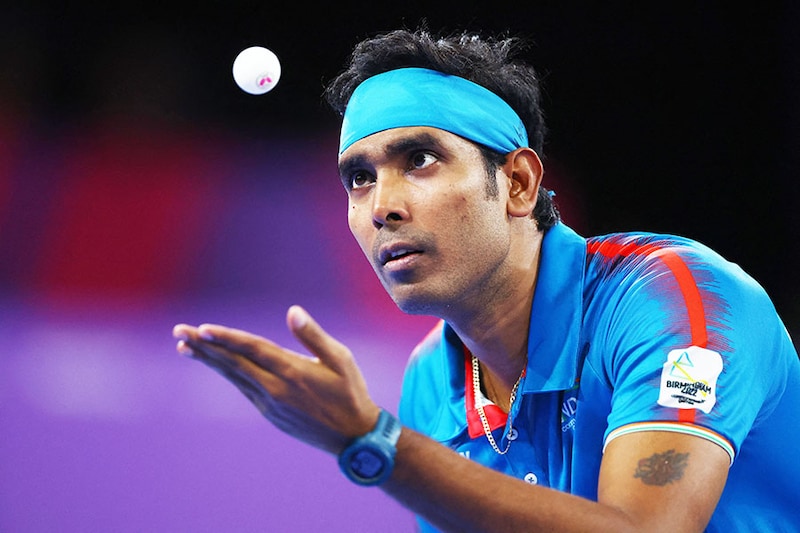 India"s Sharath Kamal Achanta in action during the men"s singles table tennis final match against England"s Liam Pitchford at the Commonwealth Games, Birmingham, Britain. August 8, 2022. 40-year-old Sharath capped his best ever CWG show by winning the singles gold, in addition to gold in the men"s team and mixed team events. He has a total of 13 medals from 5 CWG appearances.