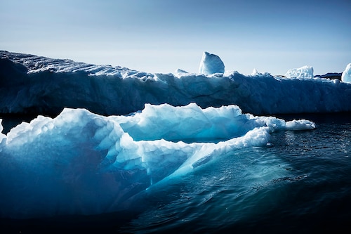 An iceberg near Narsaq, Greenland, on Aug. 23, 2021. The warming at the top of the globe, a sign of climate change, is happening much faster than previously described compared with the global average, scientists said on Thursday, Aug. 11, 2022. (Carsten Snejbjerg/The New York Times)