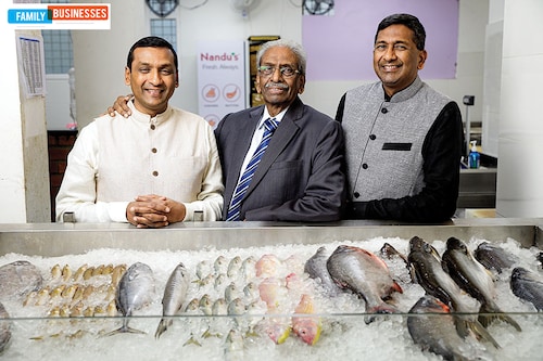 Both Narendra K Pasuparthy (left) and Naveen K Pasuparthy (right) came back from the US to join their father PS Nanda Kumar (centre) in the livestock farming business founded by him in 1963
Image: Selvaprakash Lakshmanan for Forbes India Both Narendra K Pasuparthy (left) and Naveen K Pasuparthy (right) came back from the US to join their father PS Nanda Kumar (centre) in the livestock farming business founded by him in 1963
Image: Selvaprakash Lakshmanan for Forbes India