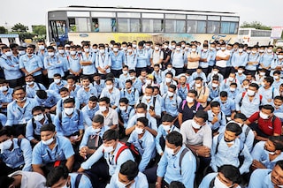 A file photo of workers of Ford Motor Co. gathered outside Ford"s car assembly and engine-making facility in Sanand, Gujarat, India,  on September 21, 2021. Image: Amit Dave / Reuters