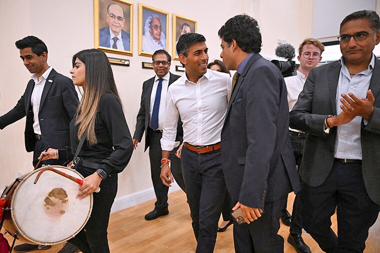 Leader of Britain"s Conservative party and Prime Ministerial candidate Rishi Sunak arrives to address a campaign hustings event by Conservative Friends of India at the Dhamecha Lohana centre in South Harrow, London on August 22, 2022. Sunak said he wants to change the UK-India relationship to make it a more two-way exchange that opens up easy access to UK students and companies in India.