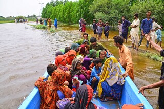 Pakistani flood victims are being move to safer place following flash flood in Tando Muhammad Khan district southern Sindh province Pakistan on august 28, 2022. Pakistan deathtoll from the floods surpassed 1,000 deaths on Sunday.A total of 1,033 peoplePakistan"s death toll from the floods surpassed 1,000 deaths on Sunday.A total of 1,033 people died. Image: Shakeel Ahmed/Anadolu Agency via Getty Images