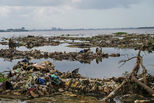 Urban and industrial waste from Yopougon, Abidjan"s biggest district, has transformed his village of 3,000 inhabitants into an open dump. Image: Sia KAMBOU / AFP Urban and industrial waste from Yopougon, Abidjan"s biggest district, has transformed his village of 3,000 inhabitants into an open dump. Image: Sia KAMBOU / AFP