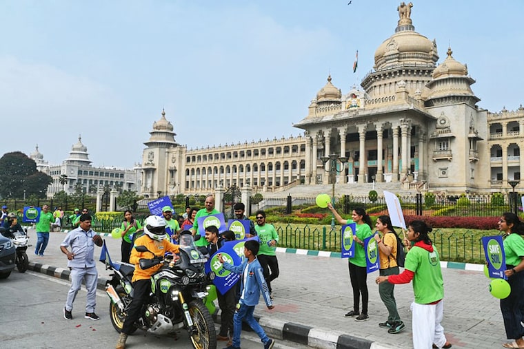 India"s yoga guru and Isha Foundation founder and spiritual proponent Jagadish "Jaggi" Vasudev, popularly known as Sadhguru, stops his motorcycle in front of the Vidhana Soudha to meet the participants of the "Save Soil" campaign, on the occasion of the World Soil Day, in Bengaluru on December 5, 2022.