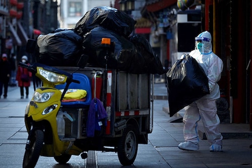 Numerous cities in China including Beijing have begun relaxing testing requirements as state media downplays the risks of the virus.
Image: Wang Zhao / AFP