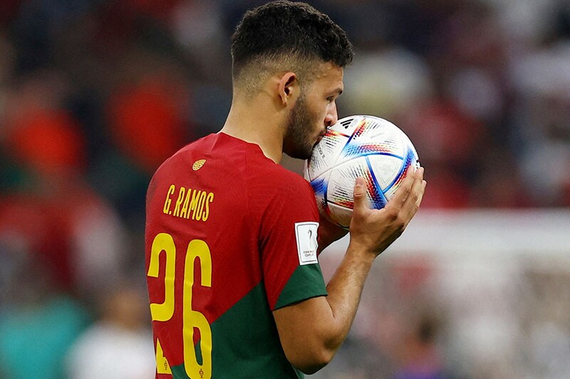 Goncalo Matias Ramos of Portugal kisses the ball after scoring a hat-trick as Portugal demolished Switzerland 6-1 to storm into the quarterfinals of the FIFA World Cup at Lusail Stadium on December 06, 2022, in Lusail City, Qatar.