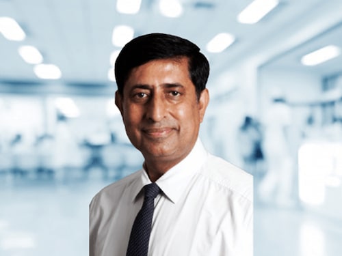 At the height of his career graph, Punjab Kings player Manzoor Dar (L) poses for a picture with his teammate, the legendary West Indies cricketer Chris Gayle after an IPL match in 2018.
Image: Courtesy Manzoor Dar