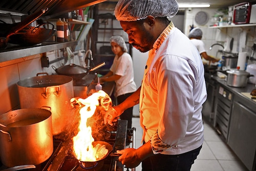 Reis, born and raised in Rio, gives a personal touch to his dishes, using cassava and palm oil, which are basic ingredients in Brazilian and African cooking.
Image: Carl De Souza / AFP