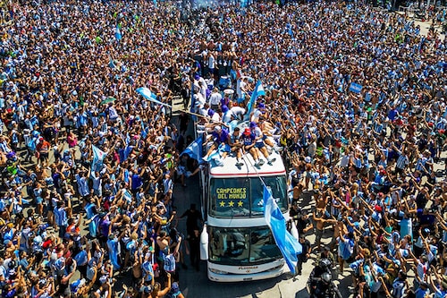"Muchachos" was heard on repeat in central Buenos Aires where huge crowds of fans gathered to welcome the victorious team. Image Credit: Photography TOMAS CUESTA / AFP