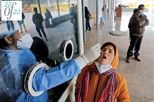 A health care worker collects a test swab sample from a woman at a Covid-19 testing centre at a hospital in New Delhi. Experts say that not everyone with symptoms is getting tested, nor are all tests being reported reliably
Image: Anushree Fadnavis / Reuters A health care worker collects a test swab sample from a woman at a Covid-19 testing centre at a hospital in New Delhi. Experts say that not everyone with symptoms is getting tested, nor are all tests being reported reliably
Image: Anushree Fadnavis / Reuters