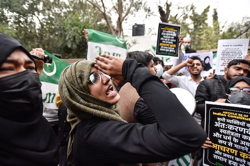 Muslim Students Federation protests and shows support at Delhi University north campus over the hijab controversy in Karnataka on February 8, 2022 in New Delhi, India. Karnataka high court is hearing petitions filed by five female students of a Udupi-based government college, who, in December last year started coming for classes wearing hijab, prompting protests from their classmates. In their petition, the students have argued that wearing the headscarf is their fundamental right.