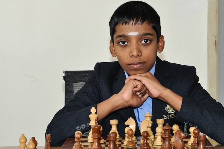 A handout photograph shows the Indian chess prodigy R Praggnanandhaa at Velammal School in Chennai in 2018. This 16-year-old grandmaster spread a wave of shock across the chess world when he beat his own hero, the world No.1 Magnus Carlsen with black pieces in the eighth round of Airthing Masters online rapid chess tournament on February 21, 2022.