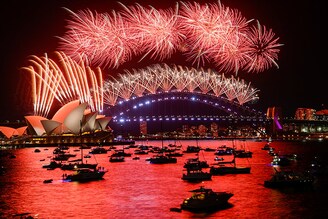 Fireworks explode over Sydney Harbour during New Year"s eve celebrations in Sydney, Australia, on January 1, 2022.
