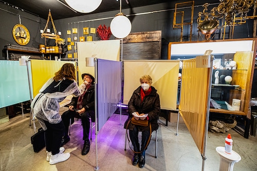 Judith Johanna Pawelke takes a coronavirus disease (COVID-19) test in her interior design store, which is currently being used as a COVID-19 test station in downtown Munich, Germany, January 19, 2022.