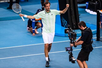Russia"s Daniil Medvedev celebrates winning his fourth round match against Maxime Cressy of the U.S. Australian Open - Melbourne Park, Australia - January 24, 2022.