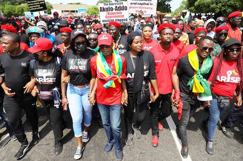 Protesters take part in a march on the second day of a demonstration over soaring living costs in Accra, Ghana, on June 29, 2022. The West African nation, reeling from a pandemic-spurred economic slump and hammered by the impact of Russia"s war in Ukraine, has seen inflation surge to more than 27 percent this month -- the highest level in almost two decades.<br>Image: Nipah Dennis / AFPâ€‹