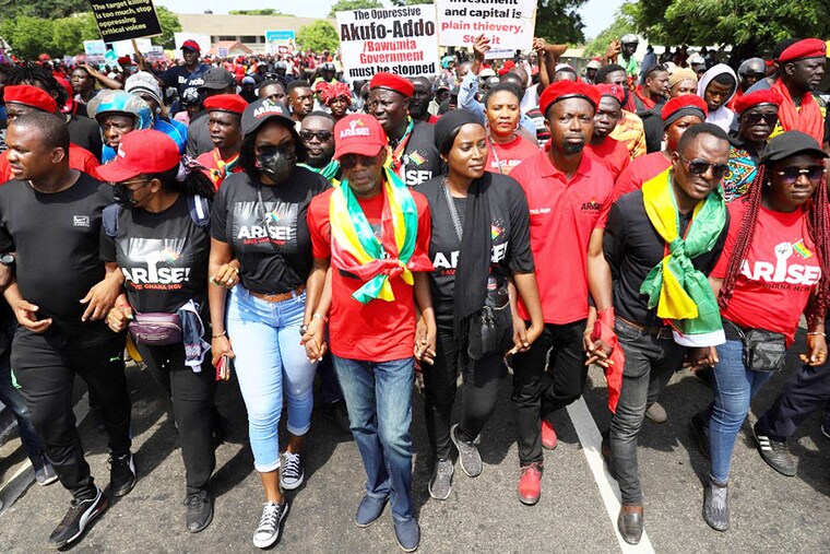 Protesters take part in a march on the second day of a demonstration over soaring living costs in Accra, Ghana, on June 29, 2022. The West African nation, reeling from a pandemic-spurred economic slump and hammered by the impact of Russia"s war in Ukraine, has seen inflation surge to more than 27 percent this month -- the highest level in almost two decades.<br>Image: Nipah Dennis / AFPâ€‹