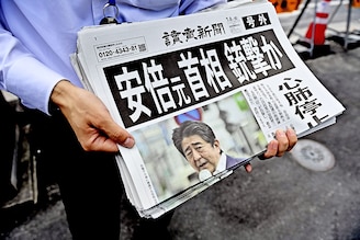 A special edition of a Japanese national newspaper is distributed in downtown Tokyo, Japan on July 8, 2022, headlining the fatal shooting of former Prime minister Shinzo Abe during a street meeting in Nara city to support a LDP (Liberal Democratic Party) candidate of the ruling party.
