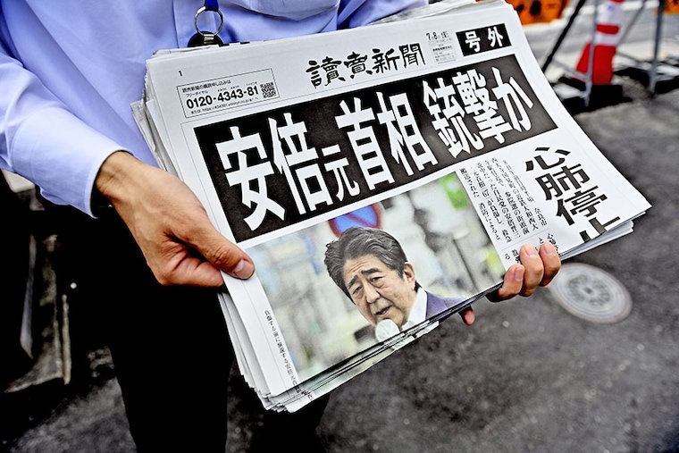 A special edition of a Japanese national newspaper is distributed in downtown Tokyo, Japan on July 8, 2022, headlining the fatal shooting of former Prime minister Shinzo Abe during a street meeting in Nara city to support a LDP (Liberal Democratic Party) candidate of the ruling party.