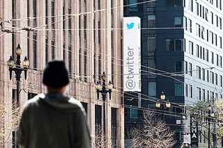 In this file photo taken on April 26, 2022 Twitter headquarters is seen in downtown San Francisco, California. Elon Musk pulled the plug on his deal to buy Twitter on July 8, 2022, accusing the company of "misleading" statements about the number of fake accounts, a regulatory filing showed. Image: Amy Osborne / AFP