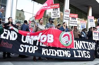 A file photo of Uber drivers" strike, holding a banner and placards at Uber"s headquarters in London, October 6, 2021. during the demonstration. Uber drivers demand better rate per mile, 15% max commission, transparency of charges on customers, no fixed rate trips, among other things. Image: Loredana Sangiuliano/SOPA Images/LightRocket via Getty Images