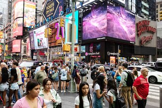 Images captured by The James Webb Space Telescope (JSWT) are displayed on screens at Times Square, New York on July 12, 2022. Released one by one starting from 10:30 am Eastern (1430 GMT) at the Goddard Space Flight Center, the new images demonstrated the full power of the $10 billion observatory, which uses infrared cameras to gaze into the distant universe with unprecedented clarity. The JWST is the most powerful telescope launched into space and it reached its final orbit around the sun, approximately 930,000 miles from Earth"s orbit, in January 2022.