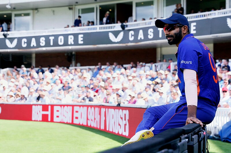 India"s Jasprit Bumrah sits on the fence during the second ODI match between England and India at the Lord"s Cricket Ground, London, Britain on July 14, 2022.