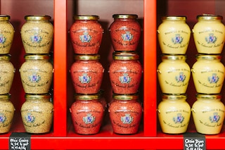 Shelves at a mustard factory’s shop in Beaune, France on Sept. 21, 2015. A perfect storm of climate change, a European war and Covid have left the French scrambling for alternatives to Dijon mustard, in short supply in the summer of 2022. (Alex Cretey Systermans/The New-York Times)