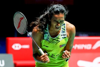 PV Sindhu celebrates match point against Wang Zhi Yi of China in their women"s singles final match during the Singapore Open at the Singapore Indoor Stadium on July 17, 2022 in Singapore.