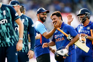 Teammates congratulate Rishabh Pant after hitting the winning runs during the third Royal London Series One Day International match between England and India at Emirates Old Trafford on July 17, 2022, in Manchester, England.