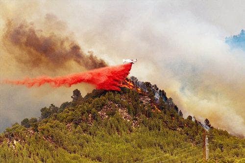 A seaplane unloads retardant on the flames of a forest fire on July 17, 2022, in Castellgali, Barcelona, Catalonia, Spain. The fire started today Sunday at noon and already affects 95 hectares, and 81 firefighting teams of the Bombers de la Generalitat are working to extinguish it, of which 13 are aerial. Image: Lorena Sopena/Europa Press via Getty Images A seaplane unloads retardant on the flames of a forest fire on July 17, 2022, in Castellgali, Barcelona, Catalonia, Spain. The fire started today Sunday at noon and already affects 95 hectares, and 81 firefighting teams of the Bombers de la Generalitat are working to extinguish it, of which 13 are aerial. Image: Lorena Sopena/Europa Press via Getty Images