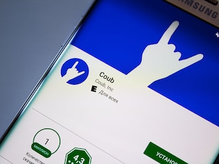 A rail passenger uses a fan to cool down as they sit with their belongings at Euston train station in central London, on July 19, 2022, as services were cancelled due to a trackside fire, and as the country experiences an extreme heat wave.
Image: Niklas Halle"n / AFP