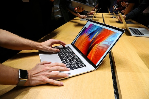 A new MacBook Pro model during an unveiling at Apple headquarters in Cupertino, Calif., Oct. 27, 2016. Apple proposed a $50 million settlement on July 18, 2022, for defective MacBook keyboards, in response to a class-action lawsuit by customers who sought repairs for the butterfly keyboard, released in certain laptops from 2015 to 2019. (Jim Wilson/The New York Times)