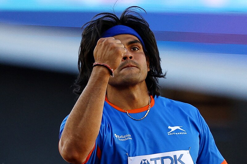 India"s Neeraj Chopra reacts after a throw in the men"s javelin final during the World Athletics Championships at Hayward Field in Eugene, Oregon, on July 23, 2022. The reigning Olympic champion created history, becoming the first ever Indian athlete to win a silver at the sporting event with his best effort of 88.13 metres.