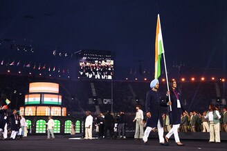 Flagbearers for India, Manpreet Singh and P V Sindhu lead India"s athletes in the Parade of Nations the opening ceremony for the Commonwealth Games at the Alexander Stadium in Birmingham, central England, on July 28, 2022.