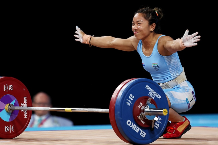 Chanu Saikhom Mirabai of Team India reacts after performing a clean & jerk during the Women"s Weightlifting 49kg Final of the Birmingham 2022 Commonwealth Games on July 30, 2022 in Birmingham, England. Chanu shattered Commonwealth Games records to win first gold medal for India