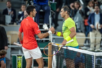 Spain"s Rafael Nadal (right) consoles Serbia"s Novak Djokovic upon winning their epic singles quarter-final match at the 2022 French Open tennis tournament in Roland Garros, Paris, France on June 1, 2022. In a gruelling four-hour battle on a humid night, 13-time champion Nadal beat World No.1 Djokovic 6-2, 4-6, 6-2, 7-6 to enter the semi-finals. Nadal now holds an 8-2 head-to-head edge over his familiar foe at Roland Garros.