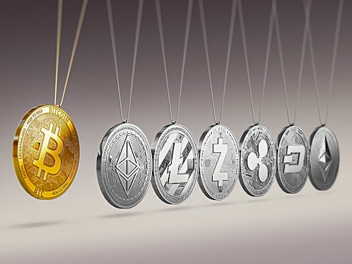 Elon Musk poses with the SpaceX Falcon Heavy rocket, at NASA"s Kennedy Space Center in Cape Canaveral, Fla., Feb. 5, 2018. In emails to workers at SpaceX and Tesla, Musk said workers were required to spend a minimum of 40 hours a week in the office. (Todd Anderson/The New York Times)