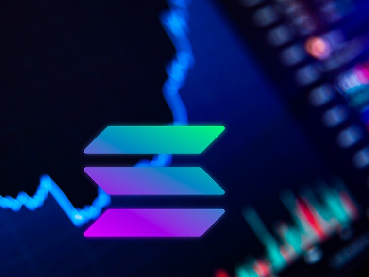 Elon Musk poses with the SpaceX Falcon Heavy rocket, at NASA"s Kennedy Space Center in Cape Canaveral, Fla., Feb. 5, 2018. In emails to workers at SpaceX and Tesla, Musk said workers were required to spend a minimum of 40 hours a week in the office. (Todd Anderson/The New York Times)